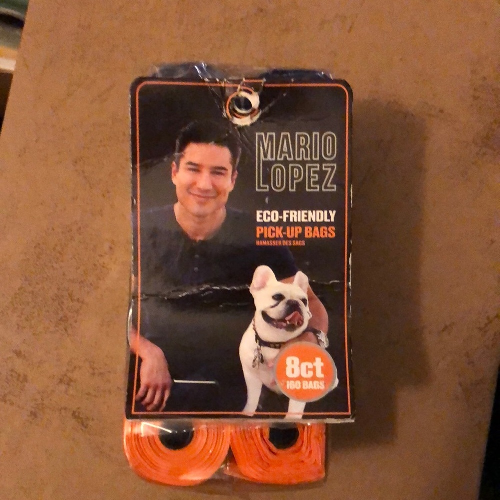 Pets pick up waste bags.